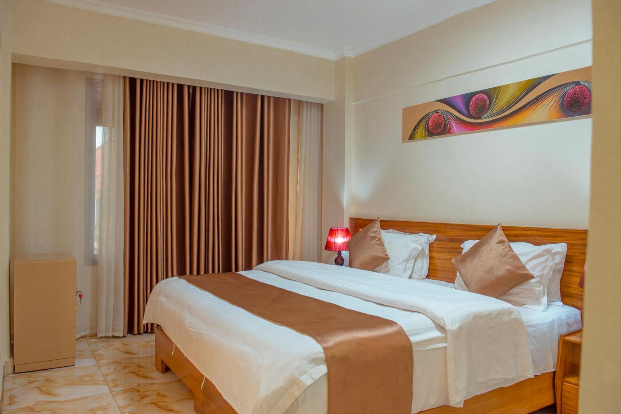 Mountain View Hotel & Apartment Кигали Экстерьер фото