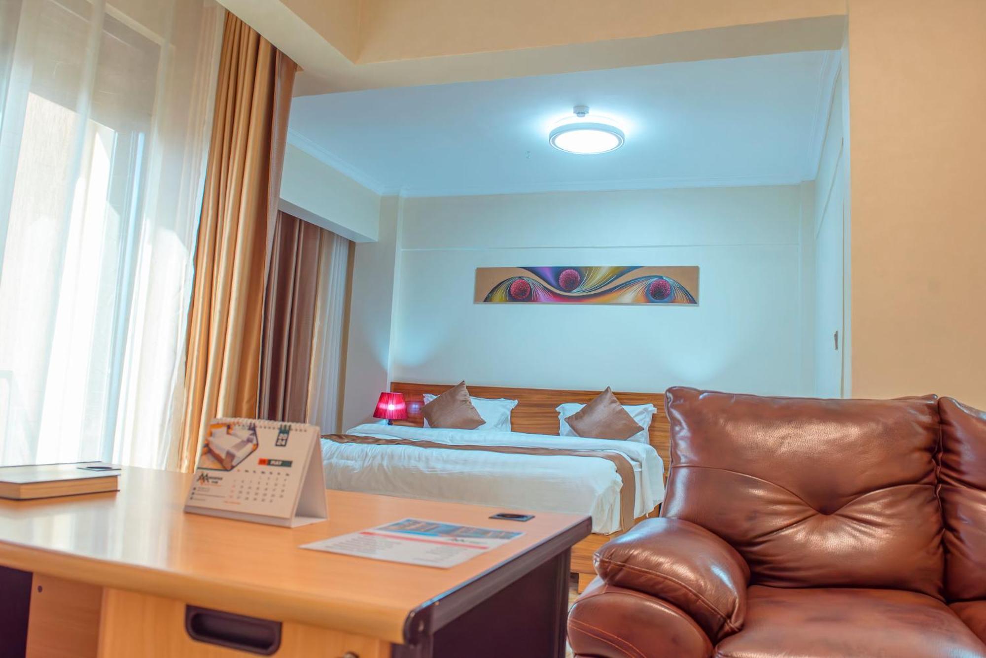 Mountain View Hotel & Apartment Кигали Экстерьер фото