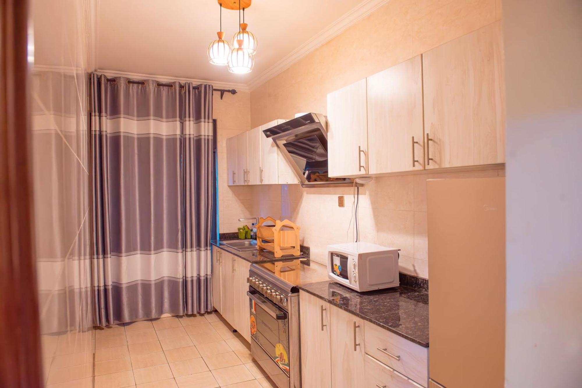Mountain View Hotel & Apartment Кигали Экстерьер фото