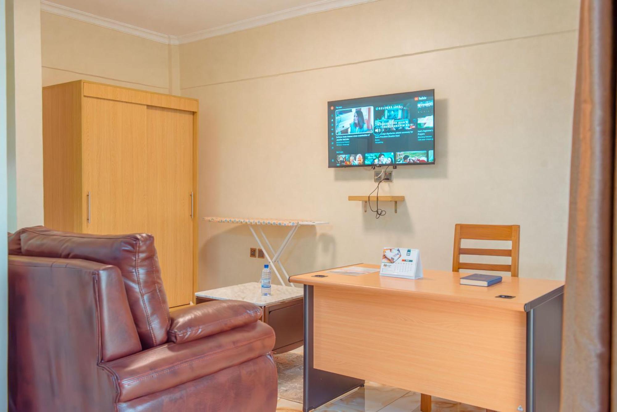 Mountain View Hotel & Apartment Кигали Экстерьер фото